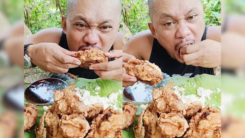 Philippines tính cấm mukbang sau khi YouTuber nổi tiếng qua đời- Ảnh 1. Ảnh chụp buổi mukbang cuối cùng trước khi qua đời của nhà sáng tạo nội dung người Philippines Dongz Apatan (37 tuổi) - Ảnh: PEP