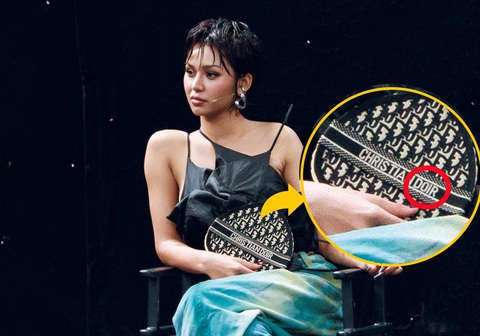 Quán quân 'The New Mentor' Lê Thu Trang dùng quạt Dior 'fake'- Ảnh 2. Netizen phát giác chiếc túi hiệu Christian Dior của Lê Thu Trang giữ kè kè bên mình có gì đó sai sai
