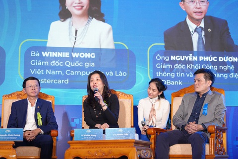 Thách thức và giải pháp về an toàn bảo mật trong thanh toán số- Ảnh 2. Bà Winnie Wong, Giám đốc Quốc gia của Mastercard tại Việt Nam, Lào và Campuchia (thứ 2 từ trái sang) phát biểu tại hội thảo Ngày không tiền mặt 2024 - Ảnh: Mastercard