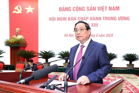 Đồng chí Phạm Minh Chính, Ủy viên Bộ Chính trị, Thủ tướng Chính phủ phát biểu. Ảnh: Trí Dũng - TTXVN Khai mạc Hội nghị Ban Chấp hành Trung ương khóa XIII- Ảnh 4.