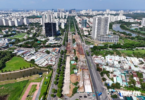 Loạt dự án cầu đường quan trọng ở TP.HCM về đích trong năm 2024- Ảnh 1. Hầm chui Nguyễn Văn Linh - Nguyễn Hữu Thọ (quận 7) là một trong những dự án cầu đường quan trọng phấn đấu hoàn thành trong năm nay - Ảnh: CHÂU TUẤN