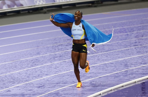 Chuyện cổ tích từ đoàn thể thao 5 VĐV tại Olympic 2024- Ảnh 3. Nhà vô địch 100m nữ Olympic Paris 2024 - Ảnh: REUTERS