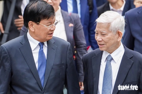 Tổng Bí thư, Chủ tịch nước Lào dự lễ phát động ủng hộ đồng bào bị ảnh hưởng bão số 3 - Ảnh 1. Tổng Bí thư, Chủ tịch nước Lào dự lễ phát động ủng hộ đồng bào bị ảnh hưởng bão số 3 - Ảnh 1.