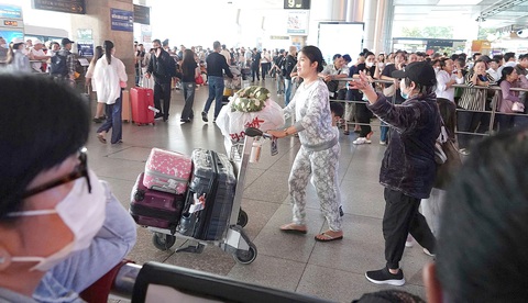 Kiều bào về quê đón Tết như trẩy hội - Ảnh 2. Kiều bào về quê đón Tết như trẩy hội - Ảnh 2.