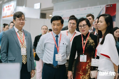 Thi làm đẹp cho thú cưng - Ảnh 4. Xem 100 người cắt tỉa lông, tạo mẫu cho chó mèo ở Lễ hội quốc tế thú cưng Việt Nam - Ảnh 4.