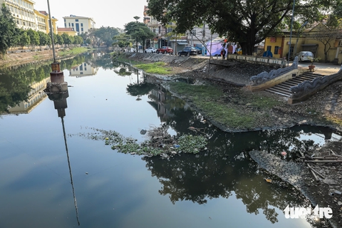 Lễ hội bơi Đăm cổ xưa ở Hà Nội bị đe dọa do nước sông Pheo ô nhiễm nặng - Ảnh 2.