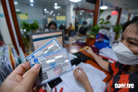 Sau sáp nhập, người dân có cần đăng ký lại thẻ bảo hiểm y tế cho đúng tên? - Ảnh 1. sáp nhập - Ảnh 1.