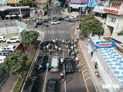 Chừa lối nhỏ để xe rẽ phải tại giao lộ để giảm ùn tắc giao thông - Ảnh 7. rẽ phải - Ảnh 6.