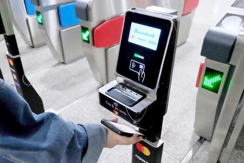 'Chạm' để đi tất cả phương tiện công cộng ở TP.HCM - Ảnh 1. không tiền mặt - Ảnh 1.