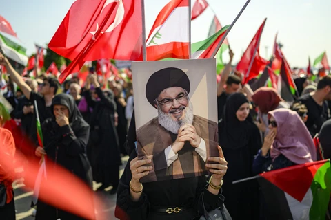 Hezbollah đứng ngoài, Lebanon tìm cách tránh bị kéo vào chiến sự Iran - Israel - Ảnh 1. Hezbollah đứng ngoài, Lebanon tìm cách tránh bị kéo vào chiến sự Iran - Israel - Ảnh 1.