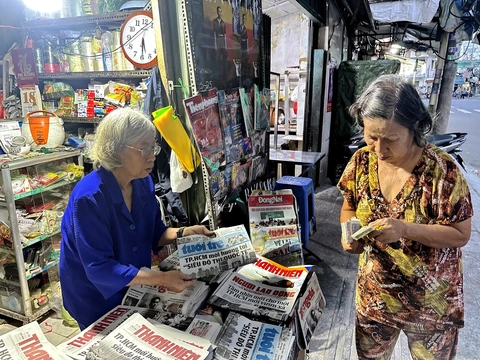 bán báo - Ảnh 1.