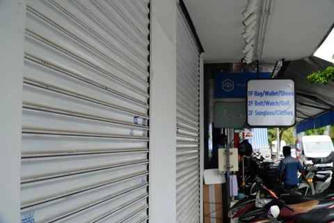 Phố đồ hiệu trên đường du lịch Đà Nẵng đóng cửa hàng loạt sau đợt kiểm tra hàng giả - Ảnh 11.