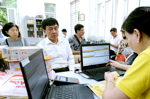 Ra mắt cổng thông tin điện tử và các kênh truyền thông của Bảo hiểm xã hội TP.HCM sau sáp nhập - Ảnh 1.
