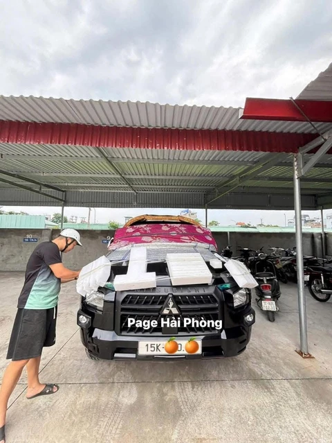 Bão số 3 Wipha sắp ập vào, hàng loạt chủ xe tất bật chống ngập cho 'xế' - Ảnh 6.