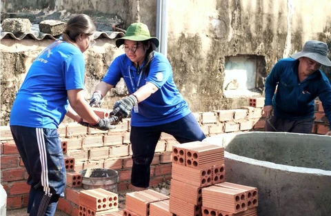 Ngọn lửa tình nguyện nơi mỗi công trình - Ảnh 1. tình nguyện - Ảnh 1.