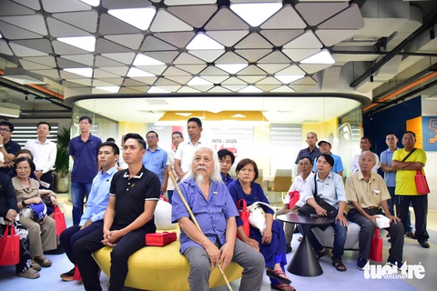 50 bạn đọc lần đầu tham quan tòa soạn báo Tuổi Trẻ - Ảnh 3.