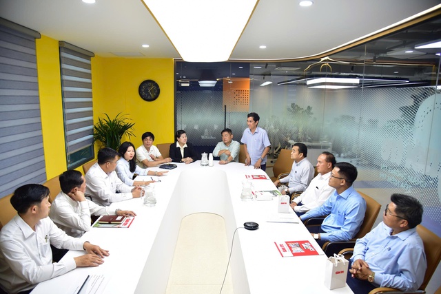 Lao media delegation visits Tuoi Tre to study digital transformation- Ảnh 2. Lao media delegation visits Tuoi Tre to study digital transformation- Ảnh 2.