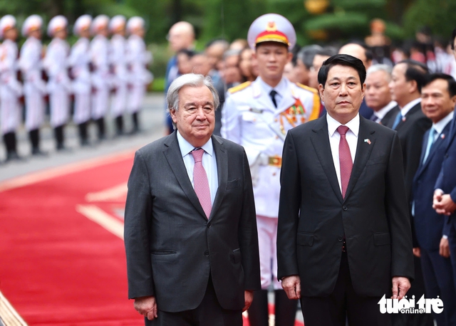Vietnamese state president welcomes UN Secretary-General in Hanoi - Ảnh 4.