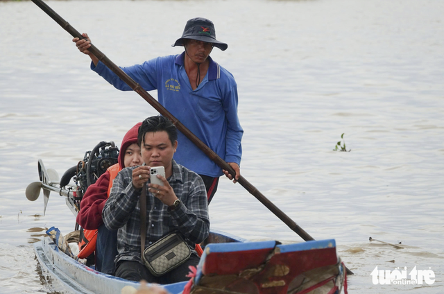 Tourists try new flood-season experiences in Vietnam’s Mekong Delta
- Ảnh 3.