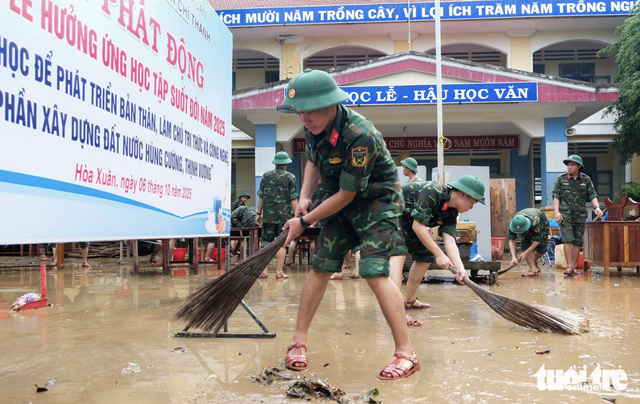 Floodwaters recede, revealing devastation in Vietnam’s Dak Lak - Ảnh 9.