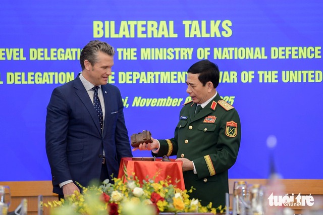 Vietnam, US pledge to strengthen defense cooperation, war legacy remediation- Ảnh 1.
