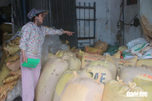 Rice traders in Da Nang struggle after last week’s floods as new heavy rains hit- Ảnh 1.