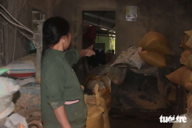 Rice traders in Da Nang struggle after last week’s floods as new heavy rains hit- Ảnh 8.