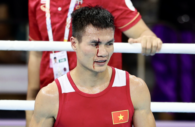 Vietnamese mother of 2 wins boxing gold at 33rd SEA Games - Ảnh 2.