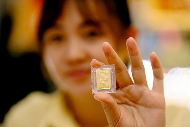 Vietnam gold prices hit record near $6,000 as global bullion rallies- Ảnh 1. Vietnam gold prices hit record near $6,000 as global bullion rallies- Ảnh 1.