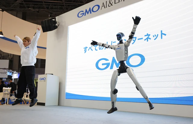 Cutting-edge humanoid robots on display at Tokyo show- Ảnh 2.