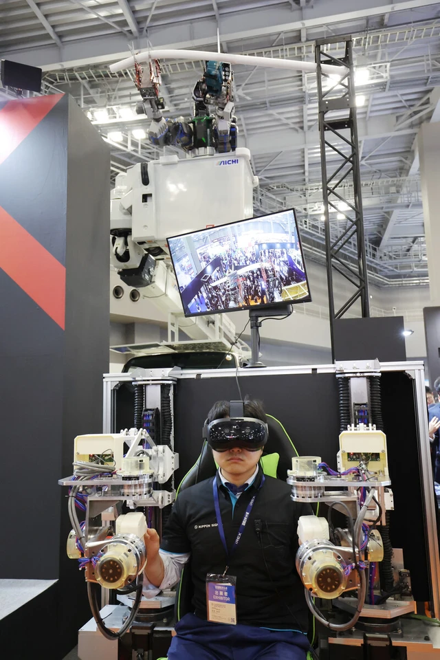 Cutting-edge humanoid robots on display at Tokyo show- Ảnh 4.