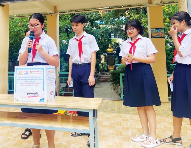 Đội viên thành phố góp thương yêu đến bà con xã đảo Thạnh An- Ảnh 7.