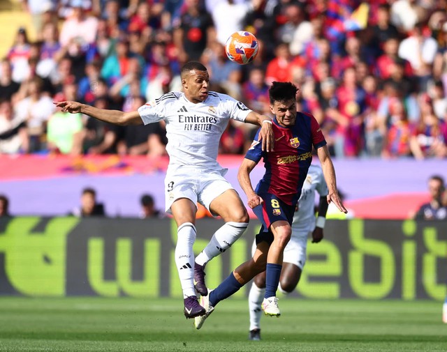 Barcelona edge closer to title with thrilling 4-3 win over Real Madrid - Ảnh 6. Barcelona edge closer to title with thrilling 4-3 win over Real Madrid - Ảnh 6.