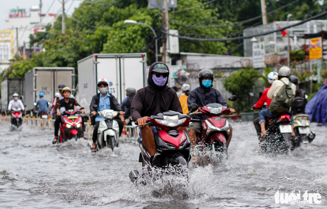 In Ho Chi Minh City, street revamp aims to end years of severe flooding
- Ảnh 2. In Ho Chi Minh City, street revamp aims to end years of severe flooding
- Ảnh 2.