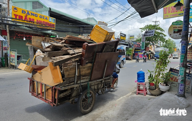 Improvised three-wheeled vehicles still common on Ho Chi Minh City streets- Ảnh 5. Improvised three-wheeled vehicles still common on Ho Chi Minh City streets- Ảnh 5.