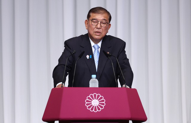 Japan PM Ishiba announces intent to stay in office- Ảnh 1.