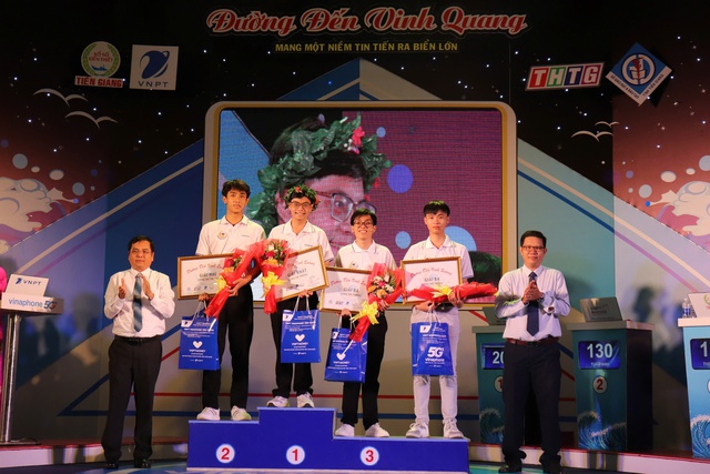 Quán quân Đường đến vinh quang lớn lên từ sạp báo của ba- Ảnh 1.