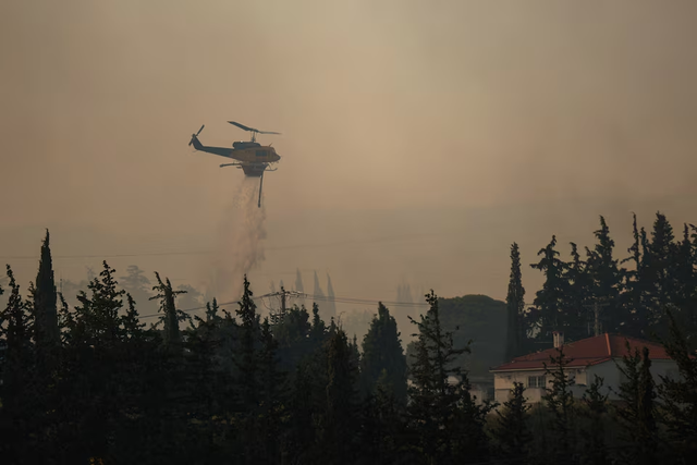 Greece battles wildfires across country, evacuates villages- Ảnh 7. Greece battles wildfires across country, evacuates villages- Ảnh 7.