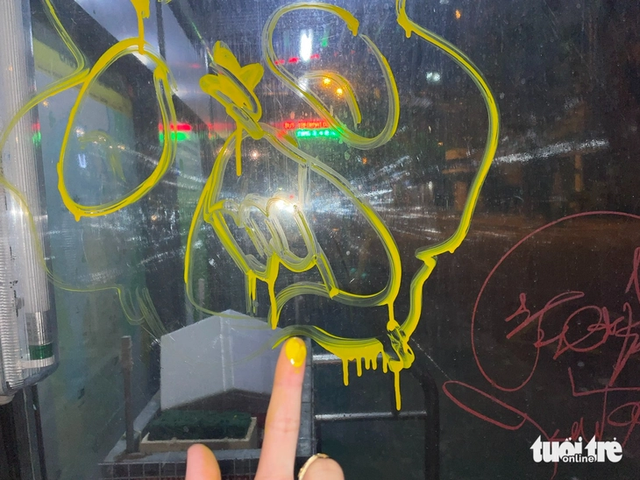 Graffiti vandalism reemerges in Ho Chi Minh City - Ảnh 1.