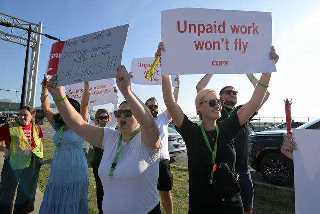 Canadian government moves to end Air Canada strike, seeks binding arbitration- Ảnh 2. Canadian government moves to end Air Canada strike, seeks binding arbitration- Ảnh 2.