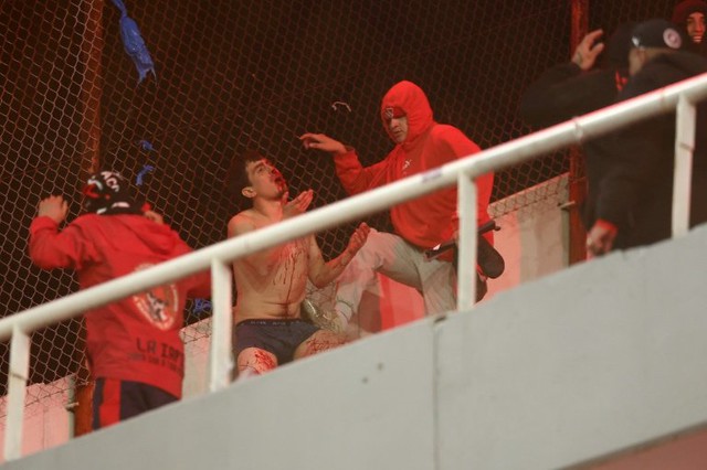 Chile, Argentina football fans trade blame over stadium violence - Ảnh 1. Chile, Argentina football fans trade blame over stadium violence - Ảnh 1.
