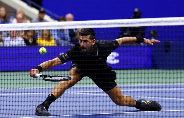 Djokovic beats back issue to blast past Norrie at US Open - Ảnh 2. Djokovic beats back issue to blast past Norrie at US Open - Ảnh 2.
