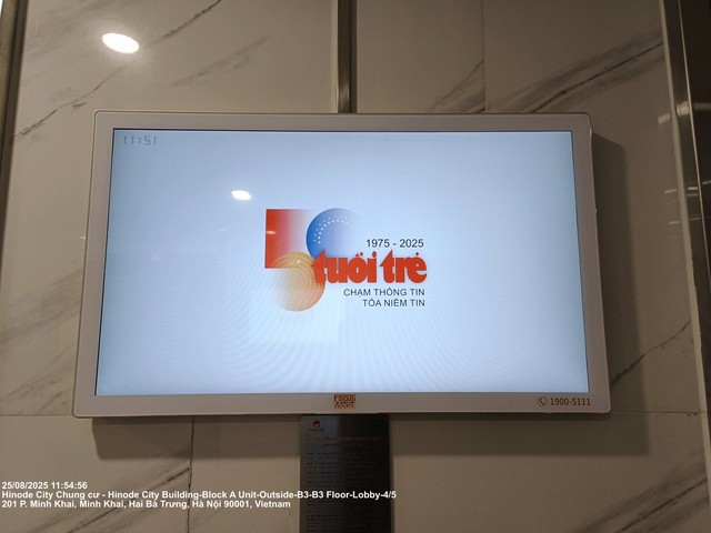 Tuoi Tre's 50th-anniversary logo shown on 5,000 elevator LCD screens in major cities - Ảnh 2. Tuoi Tre's 50th-anniversary logo shown on 5,000 elevator LCD screens in major cities - Ảnh 2.