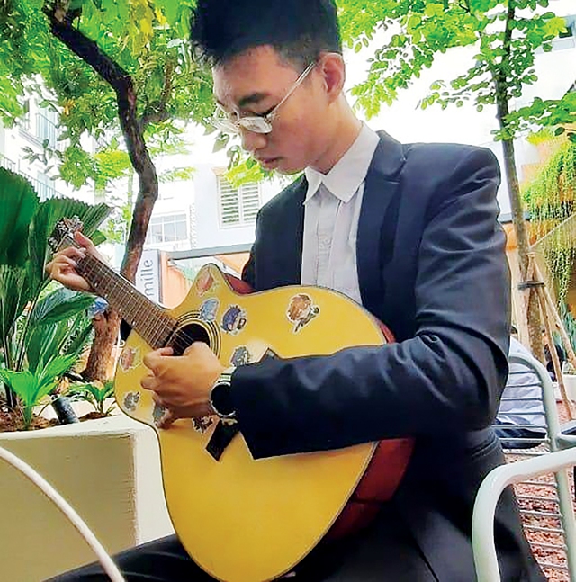 Chàng trai 'cao nhất Bình Dương' và giấc mơ âm nhạc- Ảnh 2.