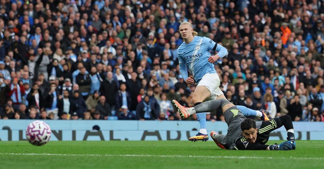 Man City and Haaland clobber United 3-0 in Manchester derby - Ảnh 1.
