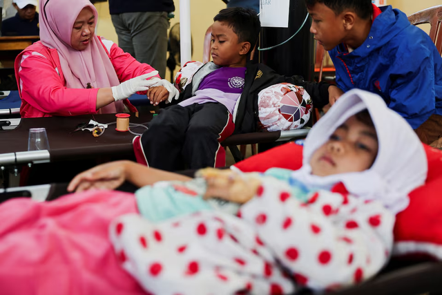 Over 1,000 Indonesians sick from school meals in more food poisoning outbreaks - Ảnh 5.