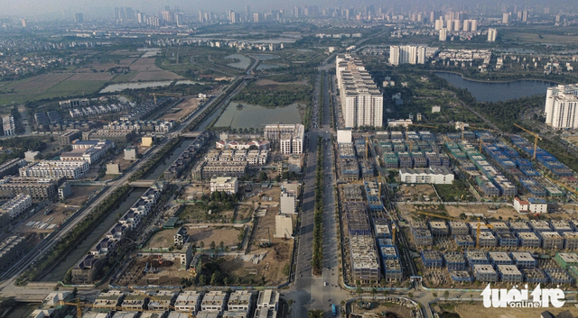 Work accelerates on Hanoi’s 41km southern axis road  - Ảnh 1.