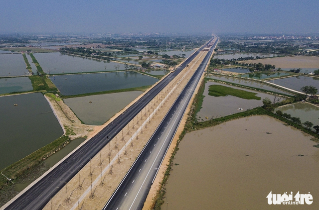 Work accelerates on Hanoi’s 41km southern axis road  - Ảnh 2.
