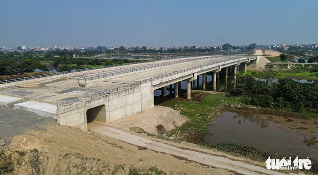 Work accelerates on Hanoi’s 41km southern axis road  - Ảnh 9.