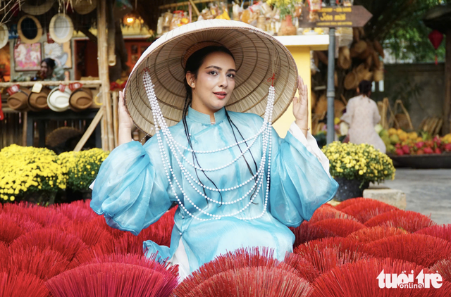 Local, int’l visitors captivated by traditional Tet festival in Vietnam’s Khanh Hoa- Ảnh 1.